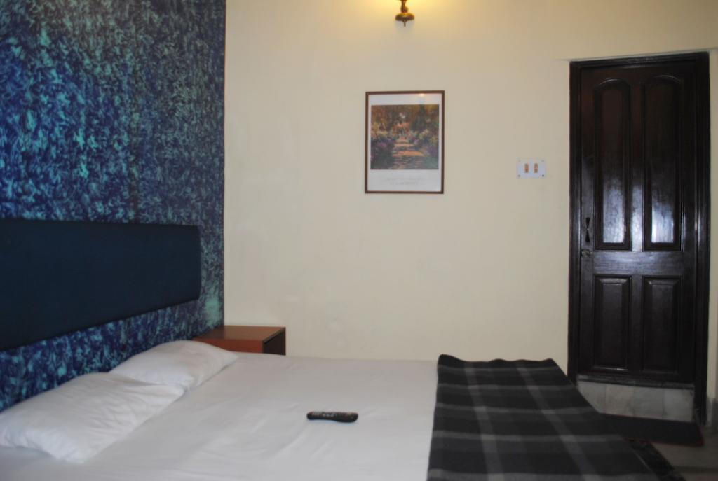 Hotel Esplanade Chambers Kalkutta Szoba fotó
